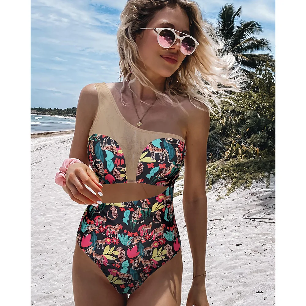 New European and American Mesh Stitching Printing One-Piece Bikini Swimsuit Women's One-Shoulder Midriff Outfit
New European and American Mesh Stitching Printing One-Piece Bikini Swimsuit Women's One-Shoulder Midriff Outfit