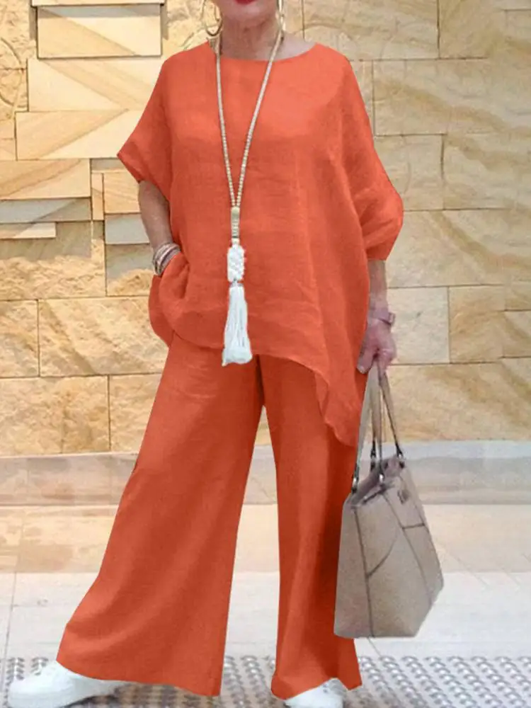 ZANZEA 2022 Stylish Tracksuits Women Matching Sets Long Sleeve Irregular Blouses Casual Wide Leg Pants Female Urban Outifit Suit
ZANZEA 2022 Stylish Tracksuits Women Matching Sets Long Sleeve Irregular Blouses Casual Wide Leg Pants Female Urban Outifit Suit