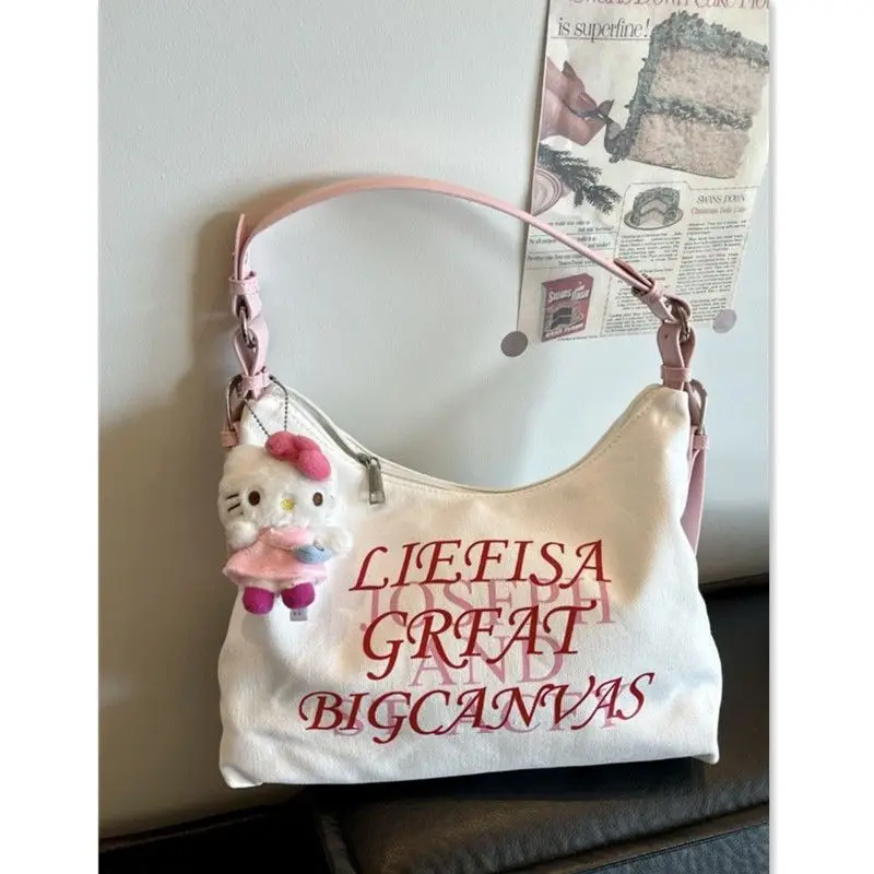 Hello Kitty Canvas Creative New Simple Shoulder Bags for Women Cool Cute Anime Sanrio Fashion Durable High Capacity Sweet Kawaii
Hello Kitty Canvas Creative New Simple Shoulder Bags for Women Cool Cute Anime Sanrio Fashion Durable High Capacity Sweet Kawaii