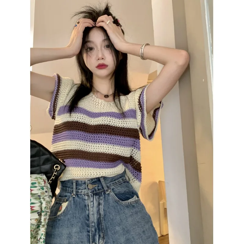 Striped short sleeved sweater women's summer thin hollow French gentle wind sweet spicy design sense niche short top
Striped short sleeved sweater women's summer thin hollow French gentle wind sweet spicy design sense niche short top