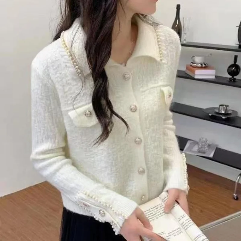 Lapel knitting cardigan women nail bead knitwear 2023 spring and autumn loose long sleeve casual lady knitting cardigan sweater
Lapel knitting cardigan women nail bead knitwear 2023 spring and autumn loose long sleeve casual lady knitting cardigan sweater