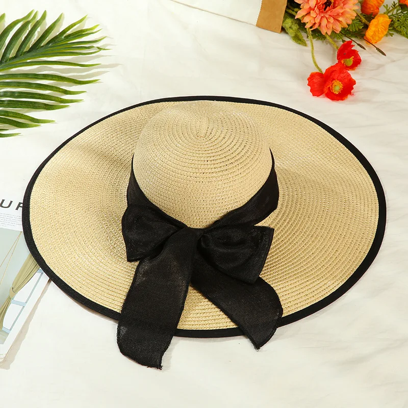 

2022New stely big summer beach along the lady bowknot straw hat shading in Europe and the manner of false uv straw hatcomfortab