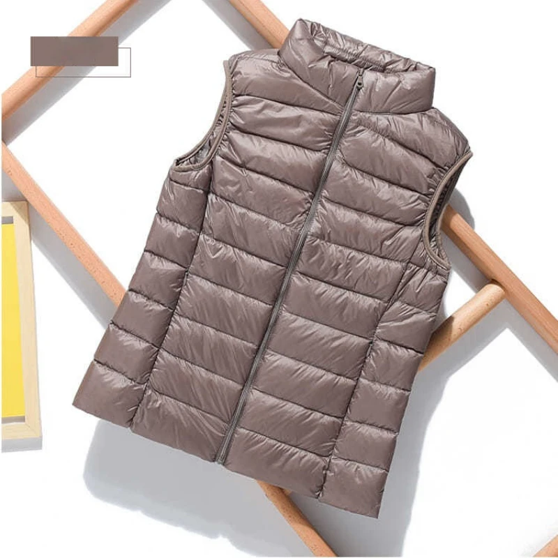 New Lightweight Solid Color Women's Down Vest Short Vest Standing Collar Vest Lightweight 90% White Duck Down Coats Jacket
New Lightweight Solid Color Women's Down Vest Short Vest Standing Collar Vest Lightweight 90% White Duck Down Coats Jacket
