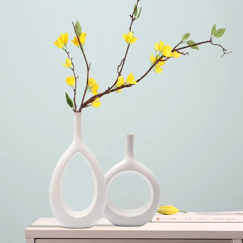 Nordic Vase Circular Hollow Ceramic Donuts Flower Pot Home Living Room Decoration Accessories Interior Office Desktop Decor Gift
Nordic Vase Circular Hollow Ceramic Donuts Flower Pot Home Living Room Decoration Accessories Interior Office Desktop Decor Gift