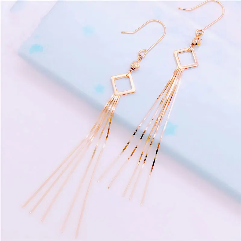 Русские 585 фиолетовые золотые европейские розовые золотые новые модные серьги-кисточки из 18-каратного золота
Русские 585 фиолетовые золотые европейские розовые золотые новые модные серьги-кисточки из 18-каратного золота