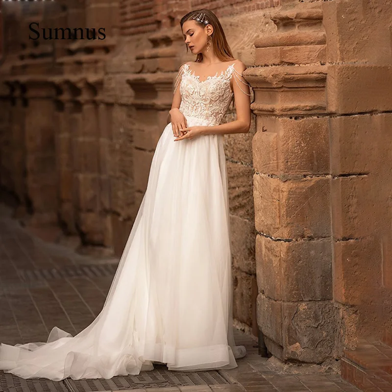 Boho Wedding Dresses Beading Straps Illusion Tulle A Line Bride Dress Vestidos de Novia Lace Appliques Princess Wedding Gown
Boho Wedding Dresses Beading Straps Illusion Tulle A Line Bride Dress Vestidos de Novia Lace Appliques Princess Wedding Gown