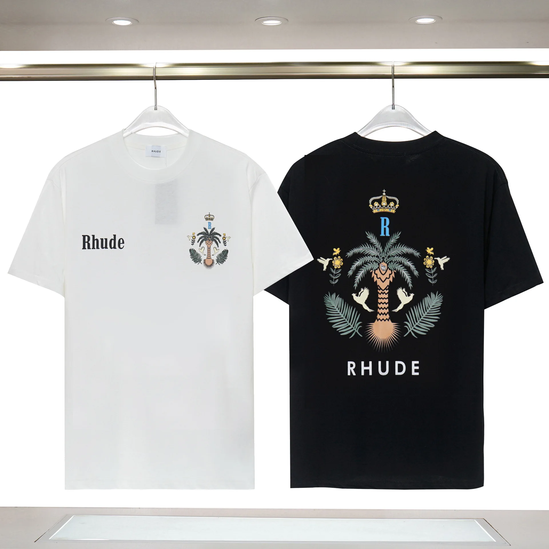 RHUDE Coconut Tree lettering print short sleeve T-shirt for men and women lovers loose half sleeve high street T-shirt
RHUDE Coconut Tree lettering print short sleeve T-shirt for men and women lovers loose half sleeve high street T-shirt