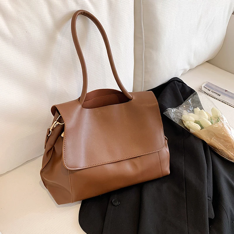 Large Capacity PU Leather Shoulder Bags Women Trend Fashion Solid Color Tote Bag Female New Casual Simple Travel Clutch Purse
Large Capacity PU Leather Shoulder Bags Women Trend Fashion Solid Color Tote Bag Female New Casual Simple Travel Clutch Purse
