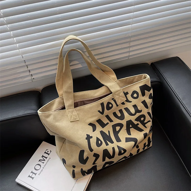 2023 Summer Canvas Bag Women Large Capacity Graffiti Bag Preppy Soft Handbag Shoulder Bag Letter Lady Versatile Casual Tote Bag
2023 Summer Canvas Bag Women Large Capacity Graffiti Bag Preppy Soft Handbag Shoulder Bag Letter Lady Versatile Casual Tote Bag