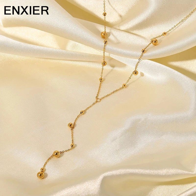ENXIER Fashion Creative Round Ball Pendant Necklace For Women Jewelry 316L Stainless Steel Gold Color Long Tassel Beads Chain
ENXIER Fashion Creative Round Ball Pendant Necklace For Women Jewelry 316L Stainless Steel Gold Color Long Tassel Beads Chain