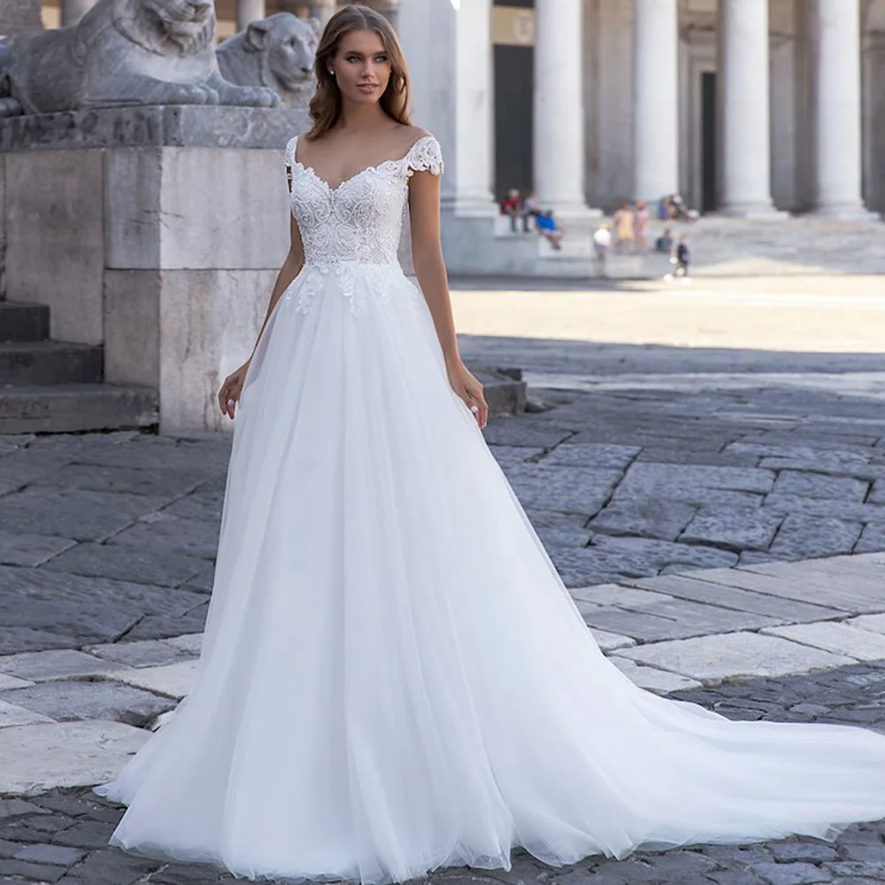 2022 Modern V Neck Wedding Dresses For Bride Custom Made Cap Sleeve Backless A Line Appliques Sizes Available Tulle Bridal Gowns
2022 Modern V Neck Wedding Dresses For Bride Custom Made Cap Sleeve Backless A Line Appliques Sizes Available Tulle Bridal Gowns