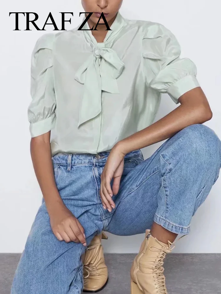 WESAY JESI модная футболка с пышными короткими рукавами однотонная однобортная рубашка на шнуровке с бантом Топ Женская летняя повседневная од... 
WESAY JESI модная футболка с пышными короткими рукавами однотонная однобортная рубашка на шнуровке с бантом Топ Женская летняя повседневная од...