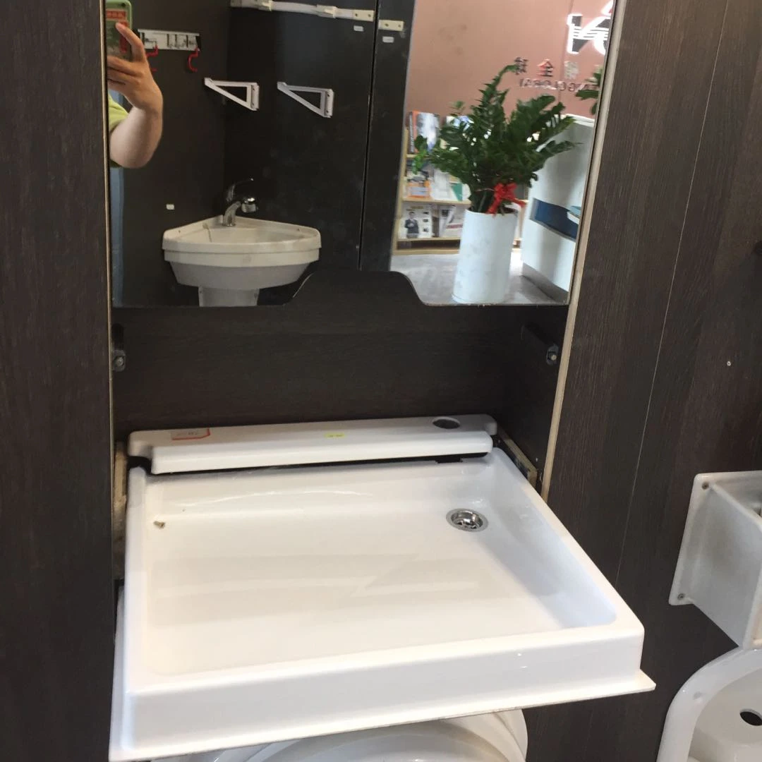 RVS caravan Campers traveling trailers acrylic plastic foldable folding sink with shower head and mirror in bathroom
RVS caravan Campers traveling trailers acrylic plastic foldable folding sink with shower head and mirror in bathroom