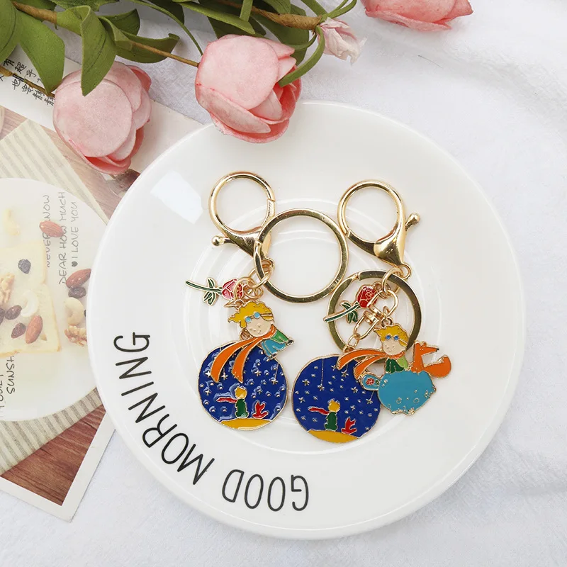 Prince Fox Rose Keychain Customized Night Sky Planet Key Chain Unisex Metal Classics Fairy Tale Jewelry Gift for Children
Prince Fox Rose Keychain Customized Night Sky Planet Key Chain Unisex Metal Classics Fairy Tale Jewelry Gift for Children