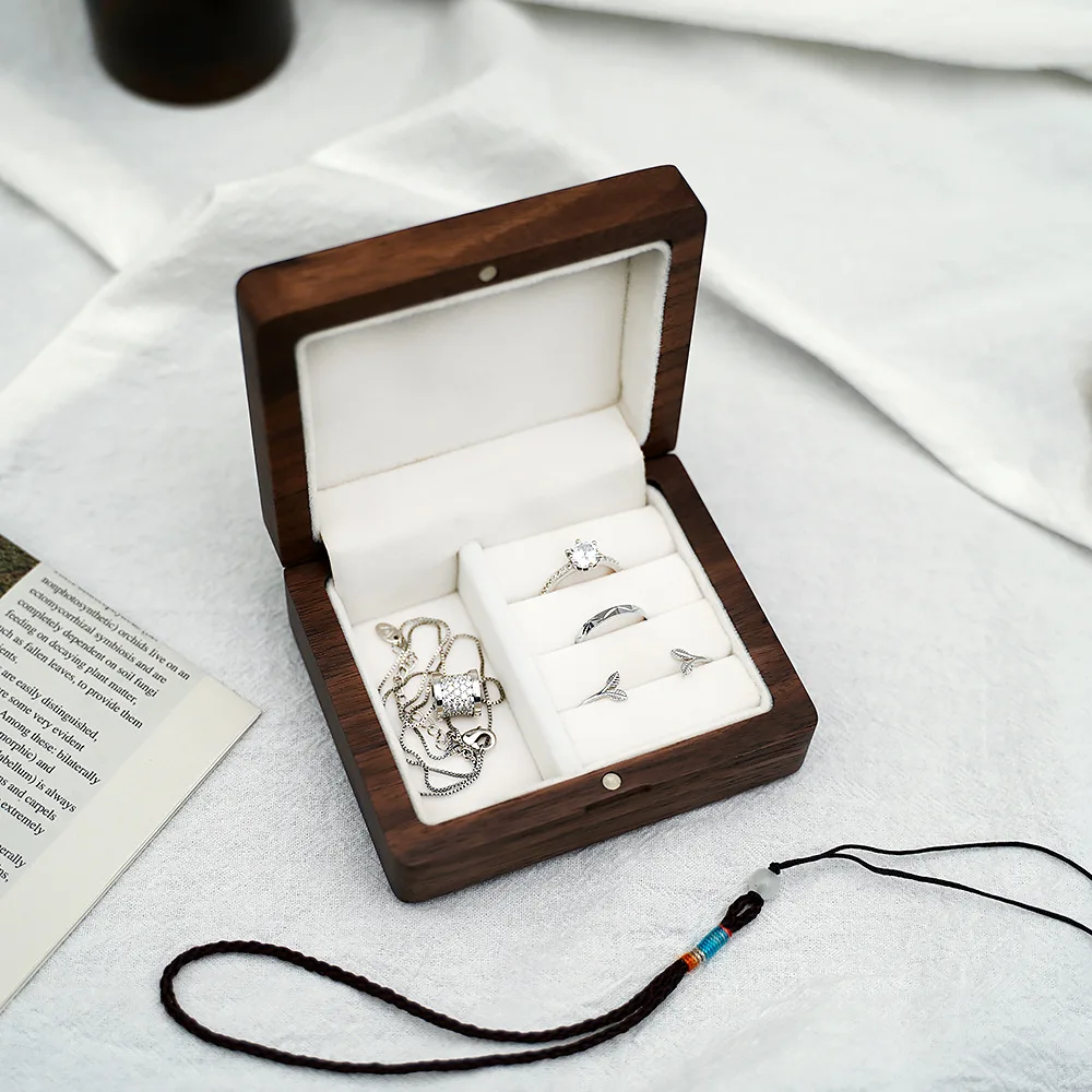 Black walnut solid wood jewelry box three gold wedding wooden portable mini table top dressing ring earring box
Black walnut solid wood jewelry box three gold wedding wooden portable mini table top dressing ring earring box