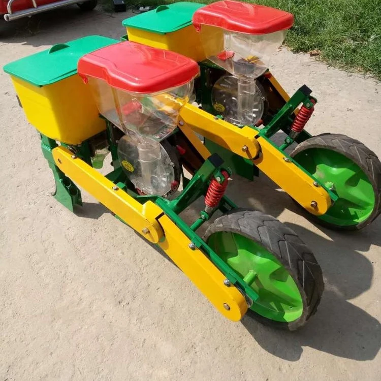 2 rows corn / soybean / seeder for hand tractor 
2 rows corn / soybean / seeder for hand tractor