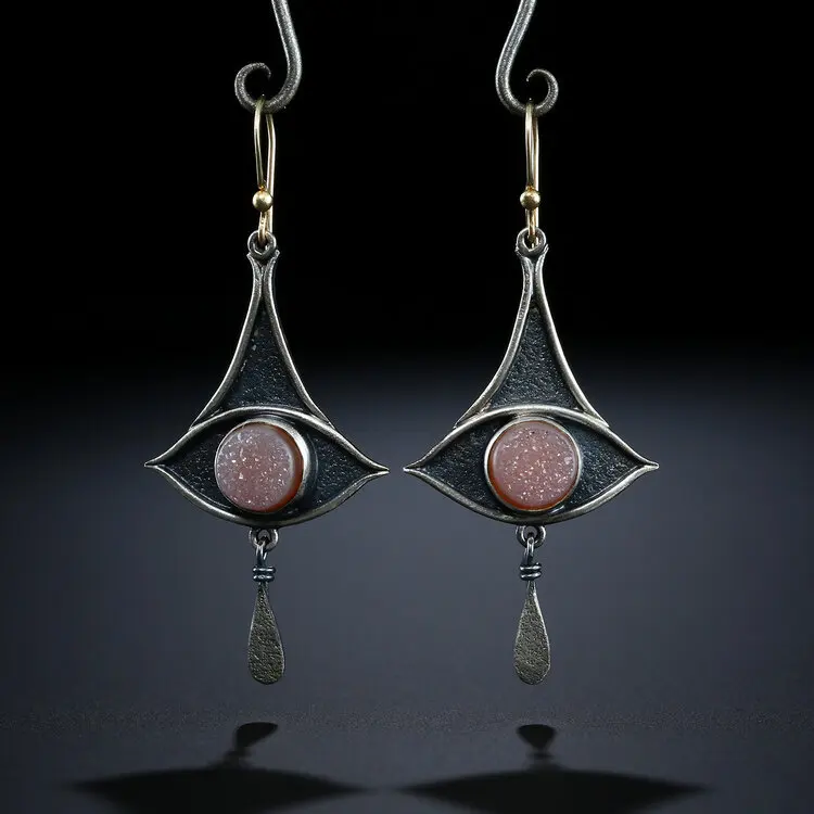 New European and American folk style geometric fan-shaped stitching earrings retro female
New European and American folk style geometric fan-shaped stitching earrings retro female
