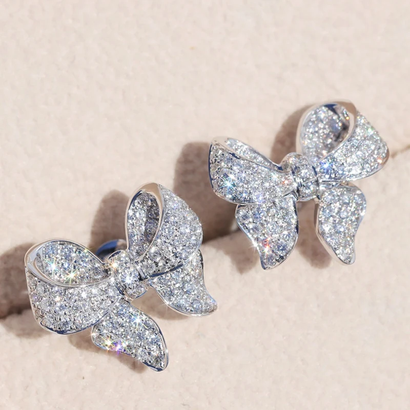 Shiny Crystal Stud Earrings Silver Color Bow Knot Ear Jewelry Zircon Women Party Luxury Jewelry
Shiny Crystal Stud Earrings Silver Color Bow Knot Ear Jewelry Zircon Women Party Luxury Jewelry