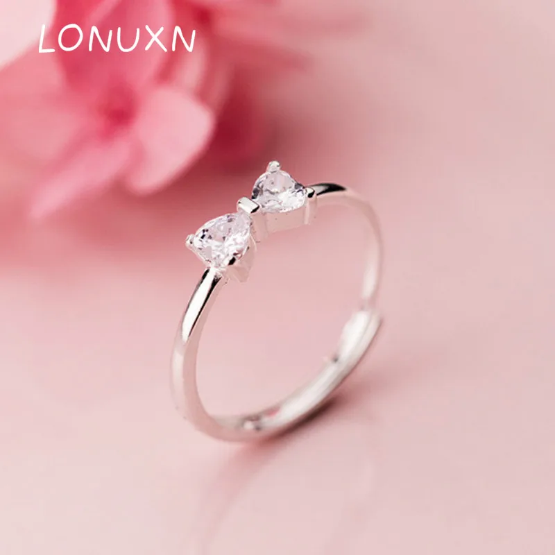 High Quality Fashion White Crystal Sunshine 925 Sterling Silver Ring Bow-knot Shape Design Earring for Women Rings Jewelry Gift
High Quality Fashion White Crystal Sunshine 925 Sterling Silver Ring Bow-knot Shape Design Earring for Women Rings Jewelry Gift