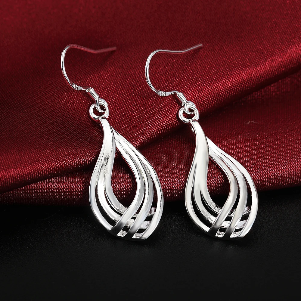 925 Silver Color Earrings fashion Jewelry elegant Woman charm Twist Wavy line drop earrings Trendsetter Christmas Gifts
925 Silver Color Earrings fashion Jewelry elegant Woman charm Twist Wavy line drop earrings Trendsetter Christmas Gifts