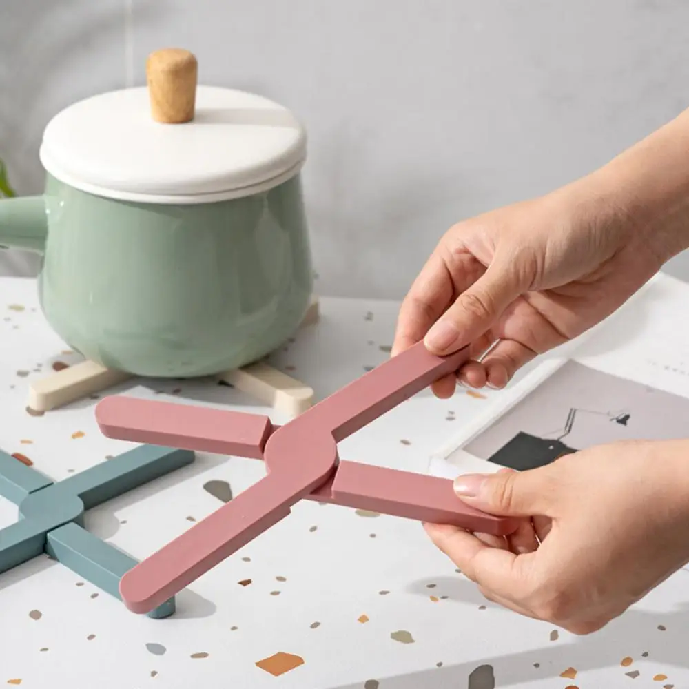Rotational Adjustment Silicone Insulation Mat Foldable Hot-resistant Placemat Creative Thickened Pot Mat Kitchen Table Trivet
Rotational Adjustment Silicone Insulation Mat Foldable Hot-resistant Placemat Creative Thickened Pot Mat Kitchen Table Trivet
