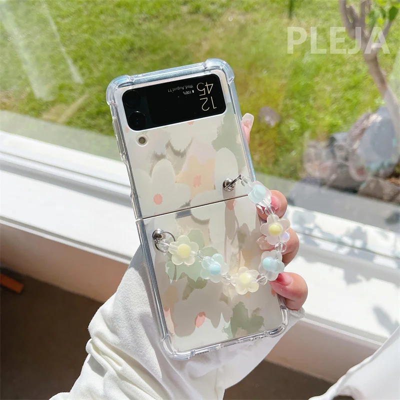 Cute Flower Wrist Strap Chain Phone Case For Samsung Galaxy Z Flip 3 4 zflip4 Cover Shockproof Soft Cases For Z Flip3 Flip4 5G
Cute Flower Wrist Strap Chain Phone Case For Samsung Galaxy Z Flip 3 4 zflip4 Cover Shockproof Soft Cases For Z Flip3 Flip4 5G