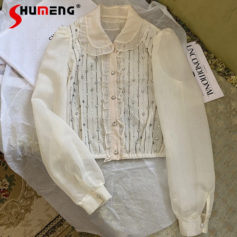 2022 Spring New Ladies Peter Pan Collar Shirt Women Fashion Ruffles Short Puff Sleeve Top Simple Diamond-Embedded Organza Blusas
2022 Spring New Ladies Peter Pan Collar Shirt Women Fashion Ruffles Short Puff Sleeve Top Simple Diamond-Embedded Organza Blusas