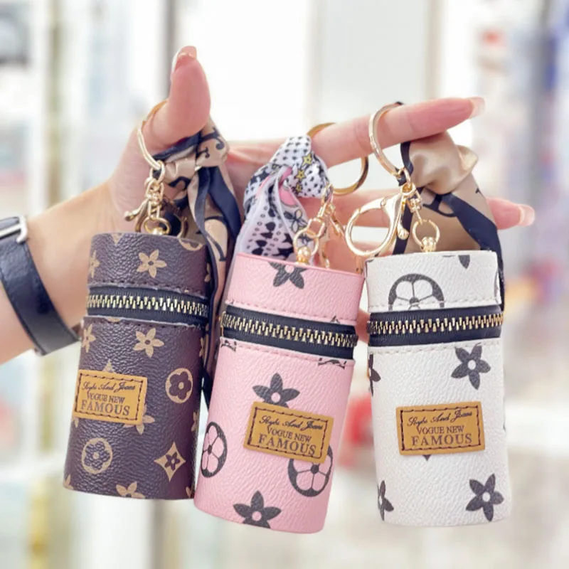 Кожаный роскошный кожаный брелок для ключей с отделением для помады 
Кожаный роскошный кожаный брелок для ключей с отделением для помады