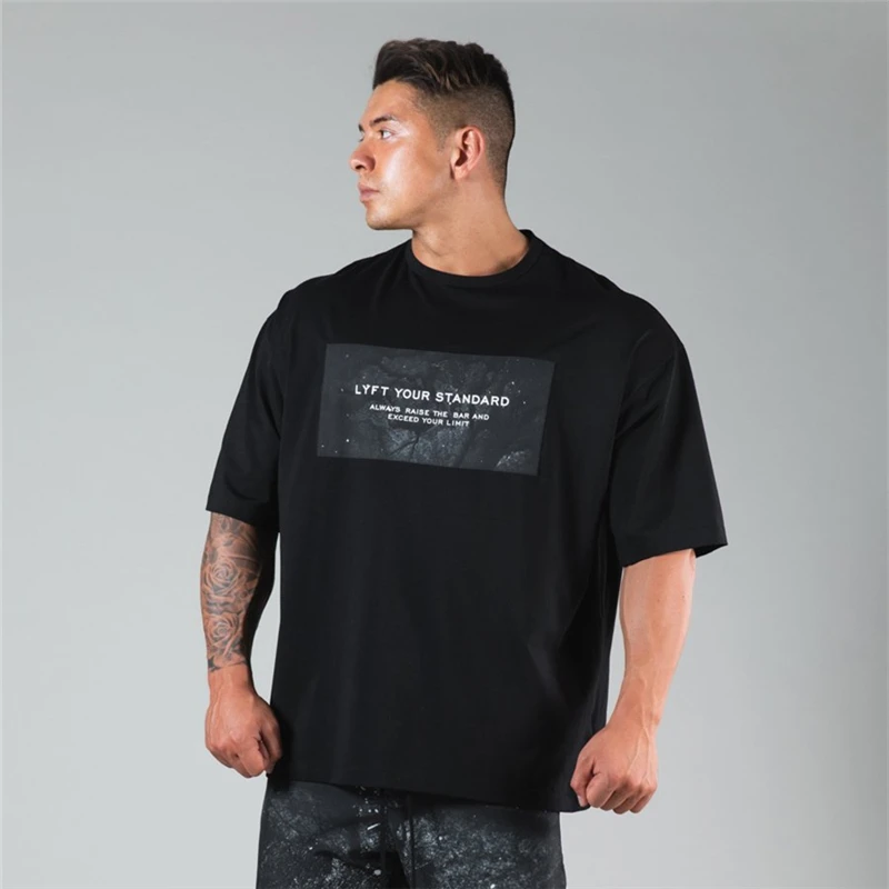 Workout Clothes Cotton Loose fit Gyms T Shirts Mens Short Sleeve T-shirt Muscle Gyms Fitness Clothing Bodybuilding Tees Tops
Workout Clothes Cotton Loose fit Gyms T Shirts Mens Short Sleeve T-shirt Muscle Gyms Fitness Clothing Bodybuilding Tees Tops