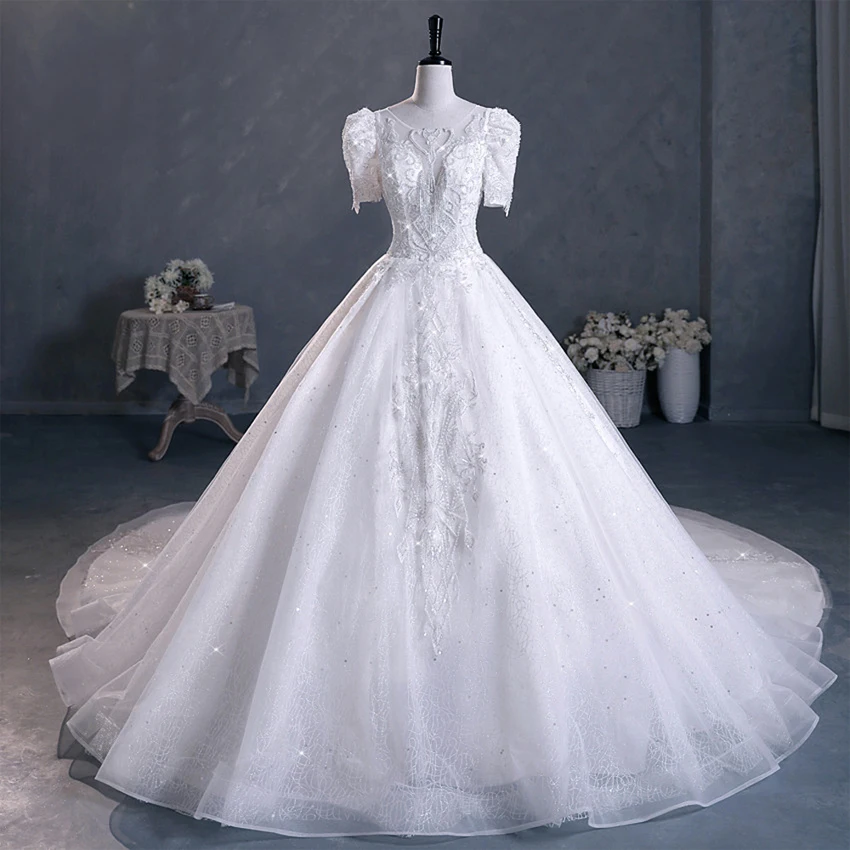 2022 New Luxury Arabian Wedding Dresses Sequin Embroidered Appliqués Gold Plated Short Sleeve White Tulle Bridal Wedding Dresses
2022 New Luxury Arabian Wedding Dresses Sequin Embroidered Appliqués Gold Plated Short Sleeve White Tulle Bridal Wedding Dresses