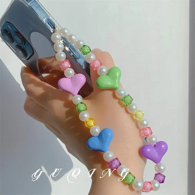 Fashion Resin Color Heart Beaded Lanyard Acrylic Imitation Pearl Anti-lost Decoration Mobile Phone Chain Female Trend Ornament
Fashion Resin Color Heart Beaded Lanyard Acrylic Imitation Pearl Anti-lost Decoration Mobile Phone Chain Female Trend Ornament