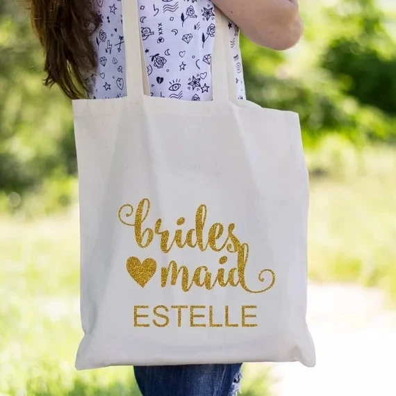personalize text Wedding Bride SQUAD Bridesmaid Maid of Honor birthday party Canva Tote Bags company gift bags clutches
personalize text Wedding Bride SQUAD Bridesmaid Maid of Honor birthday party Canva Tote Bags company gift bags clutches