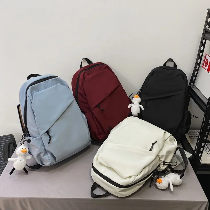 Trendy Nylon Women Backpack 2022 Cute Pendant School Bag For Girls Large-capacity Waterproof Bookbags Travel Backpacks 
Trendy Nylon Women Backpack 2022 Cute Pendant School Bag For Girls Large-capacity Waterproof Bookbags Travel Backpacks