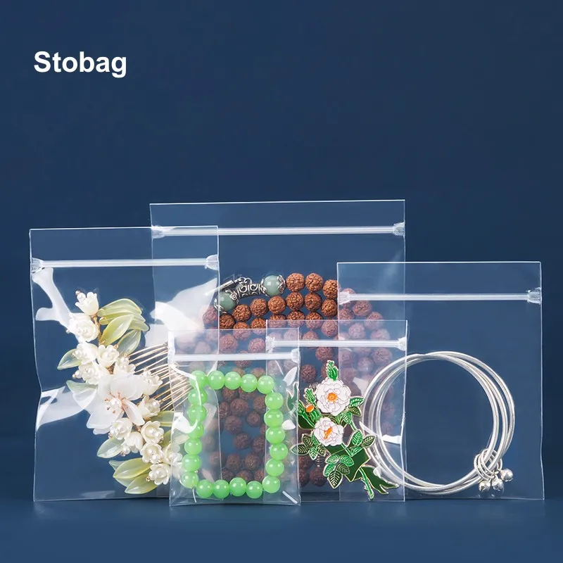 StoBag 20pcs Plastic Jewelry Packaging Ziplock Bag Thicker Transparent Small Sealed Pouch Earrings Bracelets Necklace Organizer
StoBag 20pcs Plastic Jewelry Packaging Ziplock Bag Thicker Transparent Small Sealed Pouch Earrings Bracelets Necklace Organizer