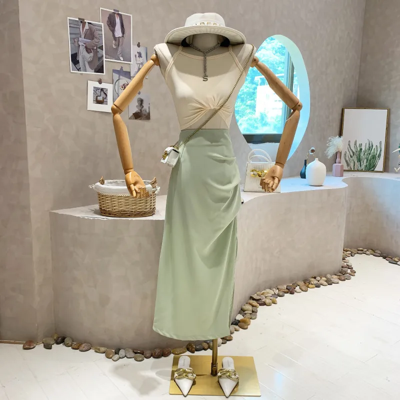 New Women's Clothing 2022 Summer Suspender top irregular high waist split Llong skirt Two piece set
New Women's Clothing 2022 Summer Suspender top irregular high waist split Llong skirt Two piece set
