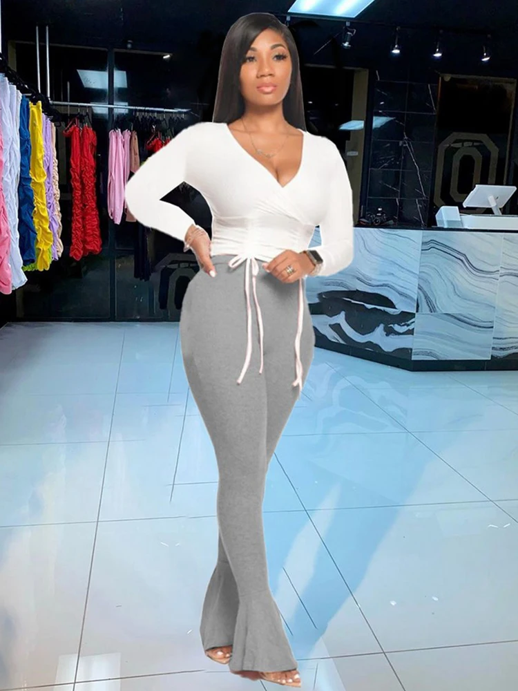 Однотонный костюм для отдыха из 2 предметов, эластичный осенний наряд для женщин, короткий топ на шнуровке и расклешенные брюки до пола с контролем живота
Однотонный костюм для отдыха из 2 предметов, эластичный осенний наряд для женщин, короткий топ на шнуровке и расклешенные брюки до пола с контролем живота