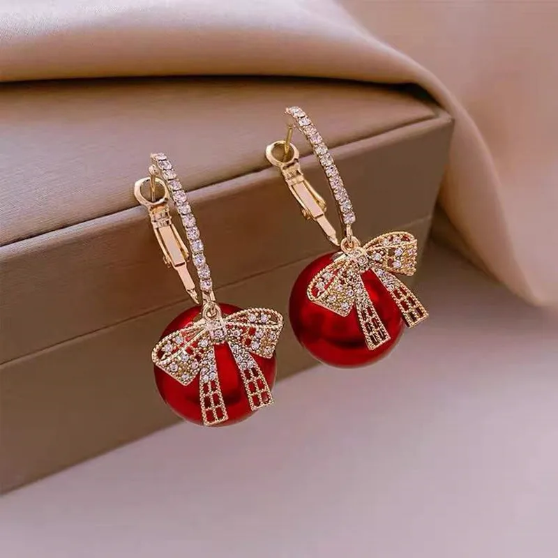 Luxury Gold Color Zircon Bowknot Stud Earrings For Women Red Pearl Flower Festive Earring Girls New Year Christmas Jewelry Gifts
Luxury Gold Color Zircon Bowknot Stud Earrings For Women Red Pearl Flower Festive Earring Girls New Year Christmas Jewelry Gifts
