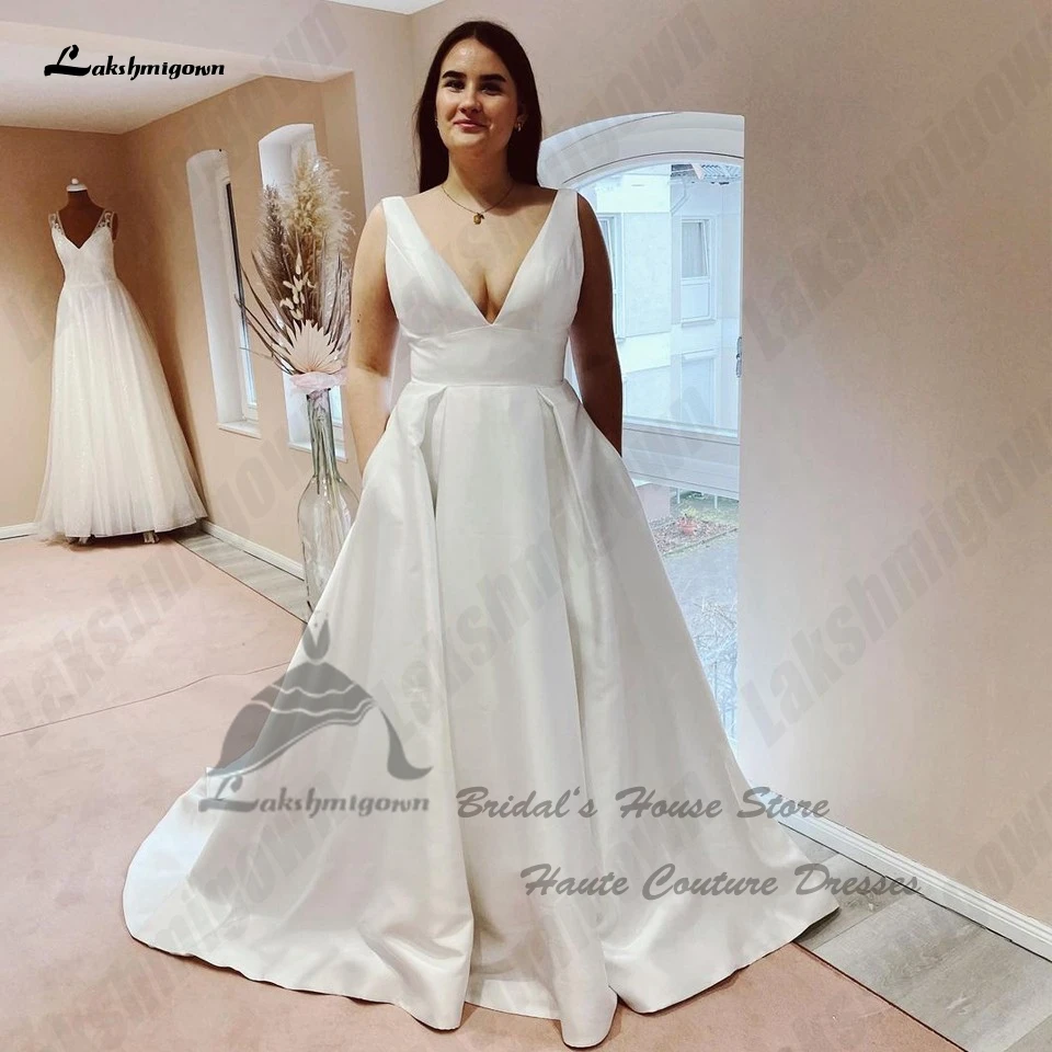 Lakshmigown размера плюс A-Line атласные свадебные платья для женщин 2023 Глубокий V-образный вырез Vestido Blanco Простые Свадебные платья с карманами
Lakshmigown размера плюс A-Line атласные свадебные платья для женщин 2023 Глубокий V-образный вырез Vestido Blanco Простые Свадебные платья с карманами