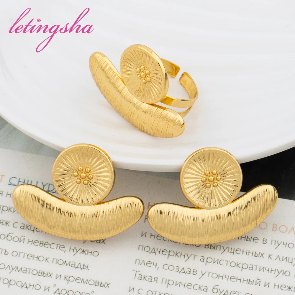 Fashion Flower Jewelry Women Ethiopian Earrings and Ring Sets Luxury Gold Color Dubai Classic Jewlery Set Weddings Party Gifts
Fashion Flower Jewelry Women Ethiopian Earrings and Ring Sets Luxury Gold Color Dubai Classic Jewlery Set Weddings Party Gifts