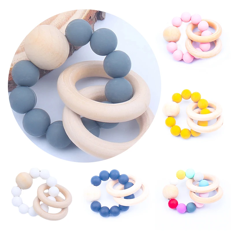 Baby Teether Silicone Bracelet Natural Teething Toy Food Grade Silicone Beads Toddler Teether Wood Ring Rattle for Baby Toys
Baby Teether Silicone Bracelet Natural Teething Toy Food Grade Silicone Beads Toddler Teether Wood Ring Rattle for Baby Toys