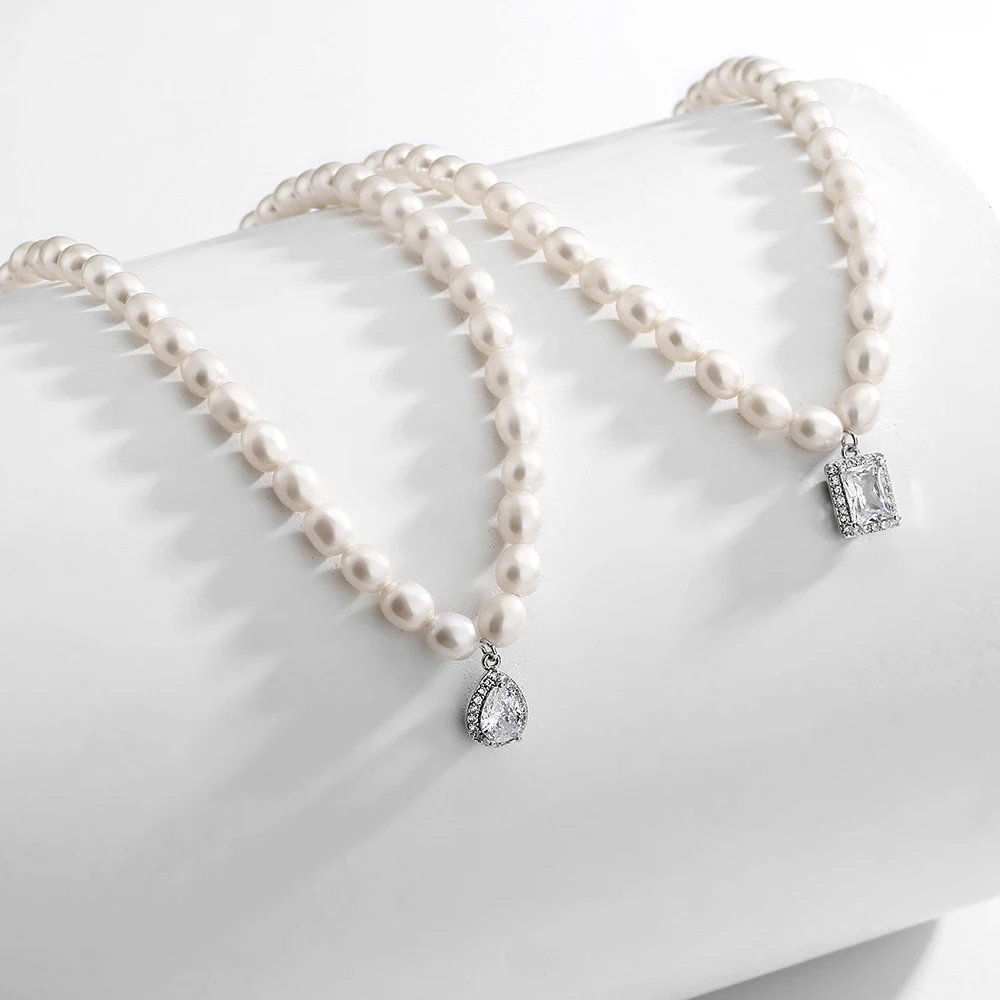 Sparkling Layer French Romantic Pearl Choker Chain CZ Cubic Zirconia Water Drop Pendant Necklace for Women Party Dinner Jewelry
Sparkling Layer French Romantic Pearl Choker Chain CZ Cubic Zirconia Water Drop Pendant Necklace for Women Party Dinner Jewelry