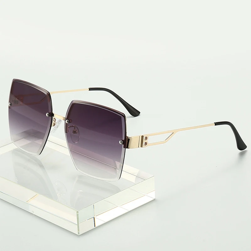 

Rimless Slice Ocean Large Frame Gradient Sunglasses For Women Men Brand Design Fashion Ladies Male Summer Travel Metal Glasses