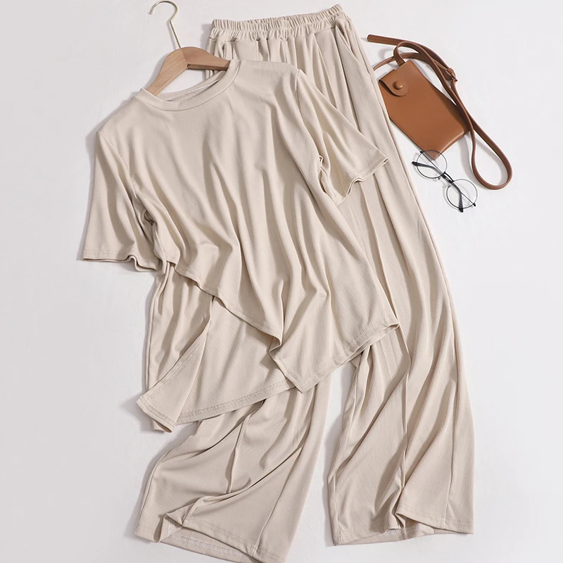 Summer New Fashion Casual Suit Female Loose Slit Solid Color Round Neck T-shirt + High Waist Wide Leg Trousers Two-piece Set
Summer New Fashion Casual Suit Female Loose Slit Solid Color Round Neck T-shirt + High Waist Wide Leg Trousers Two-piece Set