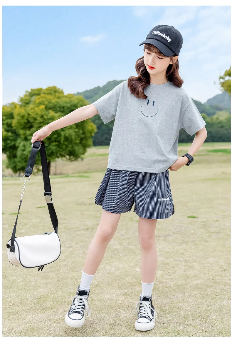 Summer Girls Cotton Smile Gray T-shirt Tops+Plaid Alphabet Short Pants Set School Kids Tracksuit Child 2PCS Outfit Suit 3-16Yrs
Summer Girls Cotton Smile Gray T-shirt Tops+Plaid Alphabet Short Pants Set School Kids Tracksuit Child 2PCS Outfit Suit 3-16Yrs