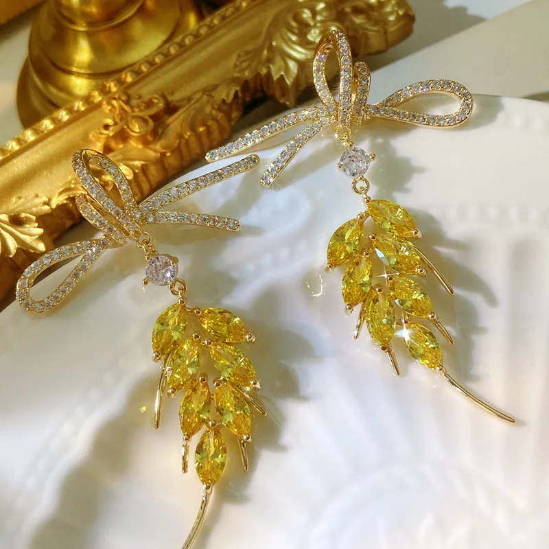 Brand New Fashion Bow-tie Wheat Ribbon Tassel Earring Ear Drops with Full Crystal for Women Brass Plated 18K Gold 925 Silver Pin 
Brand New Fashion Bow-tie Wheat Ribbon Tassel Earring Ear Drops with Full Crystal for Women Brass Plated 18K Gold 925 Silver Pin