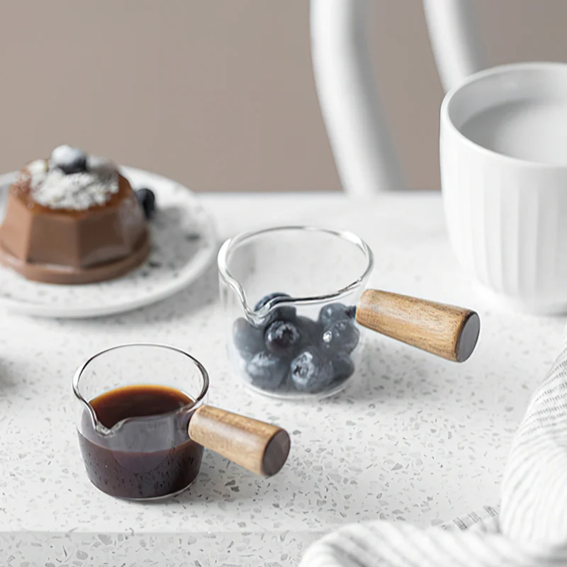 Glass Small Milk Cup Mini Wooden Handle Milk Tank Honey Cup Seasoning Small Sauce Steak Restaurant Juice Bucket Kitchen Supplies
Glass Small Milk Cup Mini Wooden Handle Milk Tank Honey Cup Seasoning Small Sauce Steak Restaurant Juice Bucket Kitchen Supplies