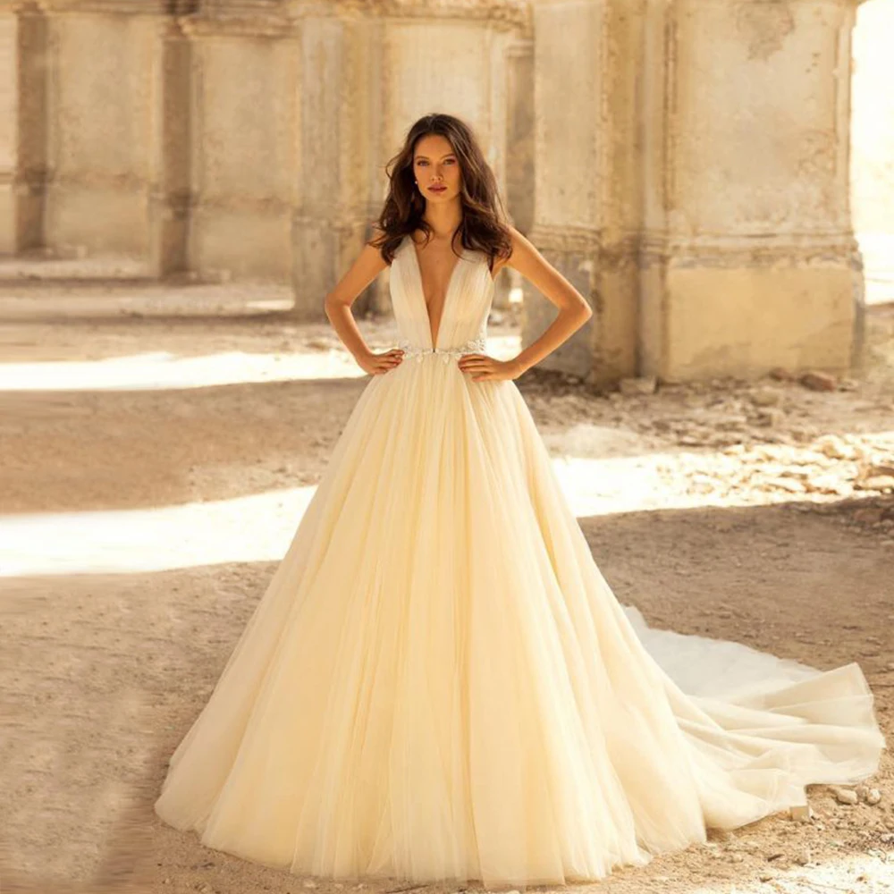 Ivory Sexy Wedding Dresses for Women Deep V Neck Bride Bridal Gowns Appliques A-Line Floor-Length Tulle Open Back Robe De Mariee
Ivory Sexy Wedding Dresses for Women Deep V Neck Bride Bridal Gowns Appliques A-Line Floor-Length Tulle Open Back Robe De Mariee