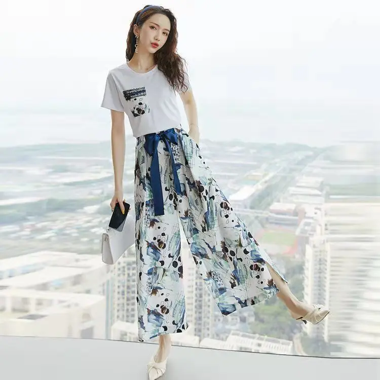 Women's Wide-Leg Pants Suit New Loose Youthful-Looking Short-Sleeved Shirt Fashionable Cropped Casual Pants Two-Piece Suit
Women's Wide-Leg Pants Suit New Loose Youthful-Looking Short-Sleeved Shirt Fashionable Cropped Casual Pants Two-Piece Suit