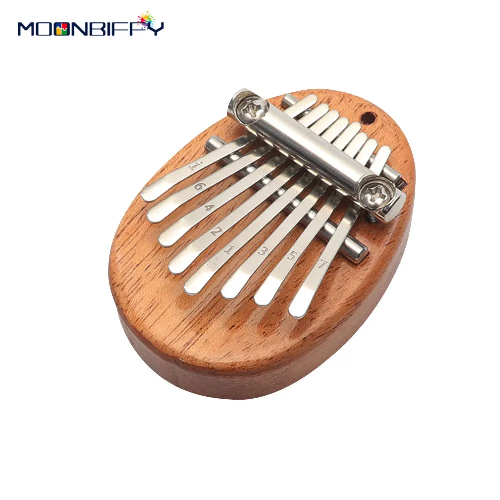 Миниатюрный инструмент Kalimba, 8 клавиш, пианино с деревянными и металлическими элементами, маленький музыкальный инструмент для детей, кулон,...
Миниатюрный инструмент Kalimba, 8 клавиш, пианино с деревянными и металлическими элементами, маленький музыкальный инструмент для детей, кулон,...