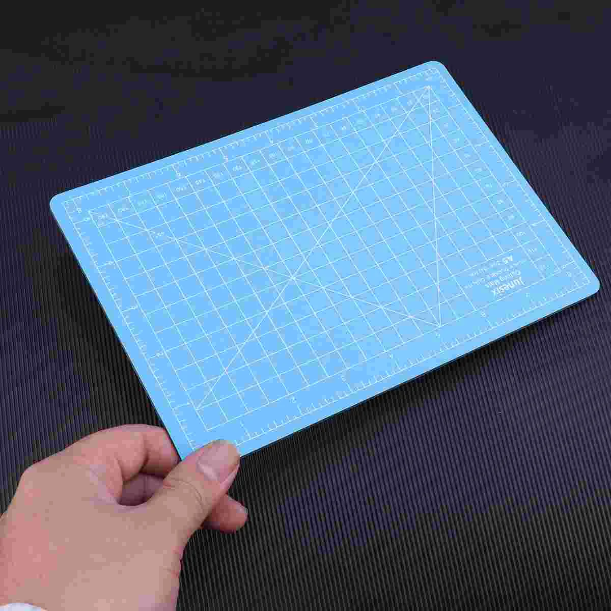 1 pc A5 Cutting Mat Self-healing PVC Professional Cutting Pad Cut Board Craft Mat for Quilting Sewing Scrapbooking
1 pc A5 Cutting Mat Self-healing PVC Professional Cutting Pad Cut Board Craft Mat for Quilting Sewing Scrapbooking